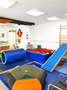 Specialized trainings in our fun gym are parts of the occupational services we offer at Growing Up Therapy